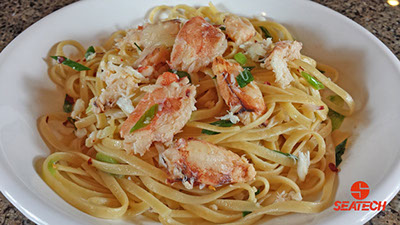 A photograph of chilean crab meat linguine.