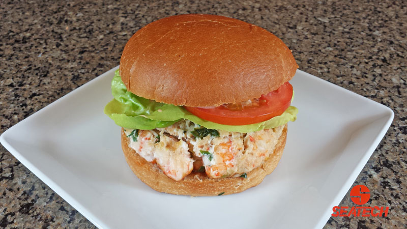 A photograph of a langostino lobster burger.